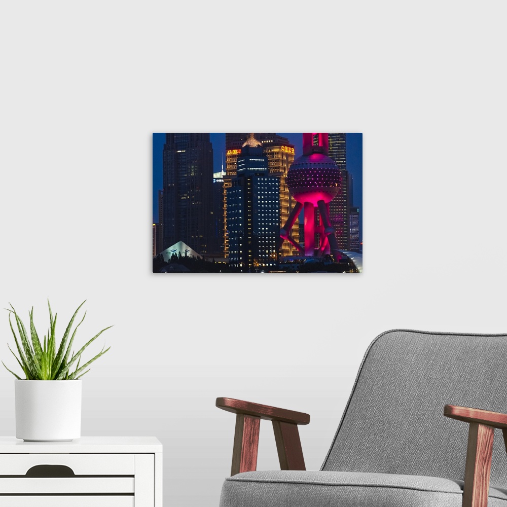 A modern room featuring Night view of Pudong skyline dominated by Oriental Pearl TV Tower, Shanghai, China