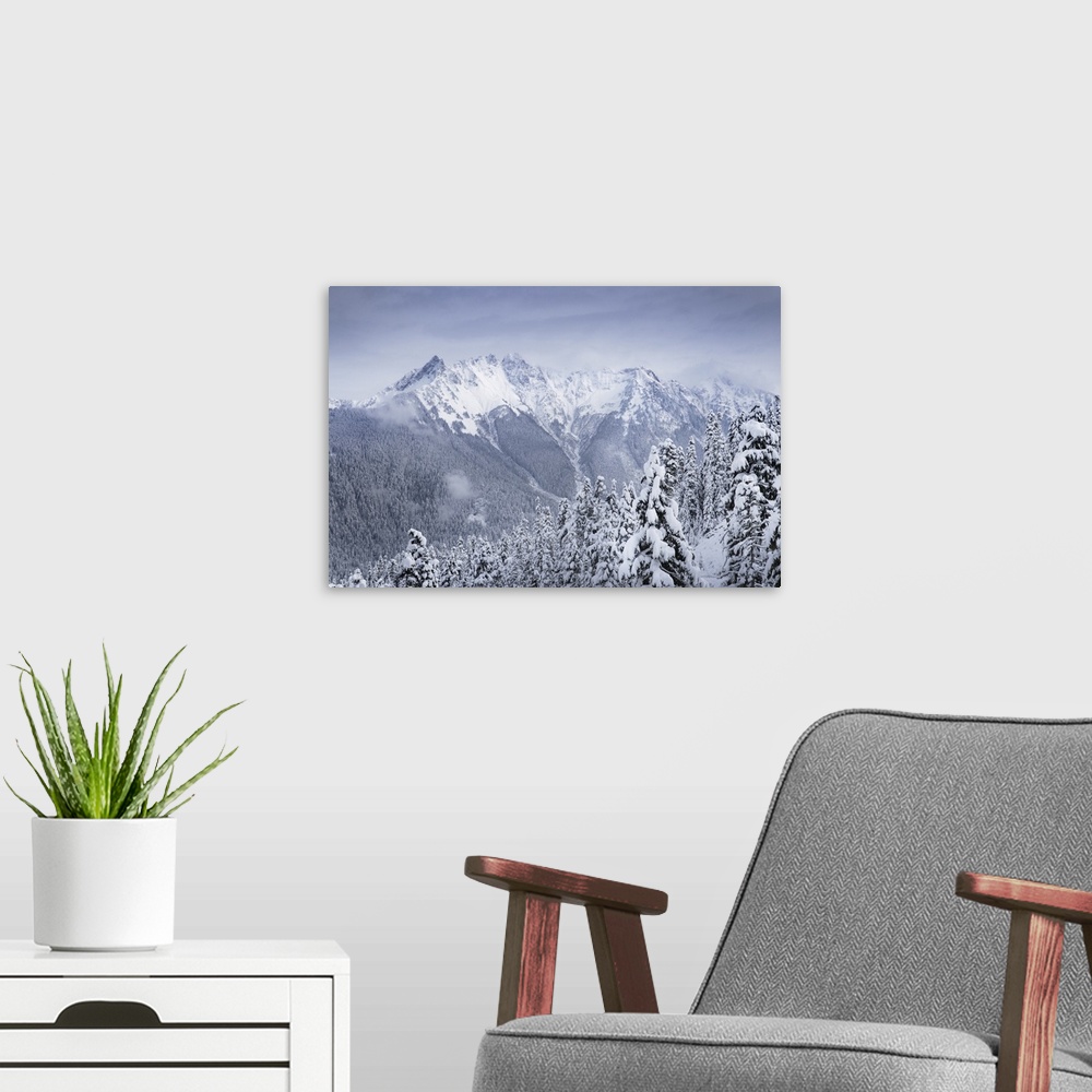 A modern room featuring North Cascades after fresh snowfall. Mount Sefrit and Nooksack Ridge in the distance, Washington ...
