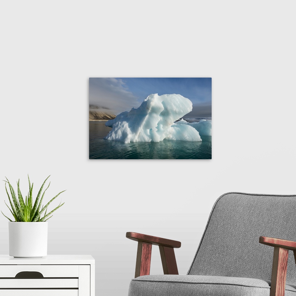 A modern room featuring Norway, Barents Sea, Svalbard, Nordaustlandet, Palanderbukta, Zeipelodden. Large iceberg.