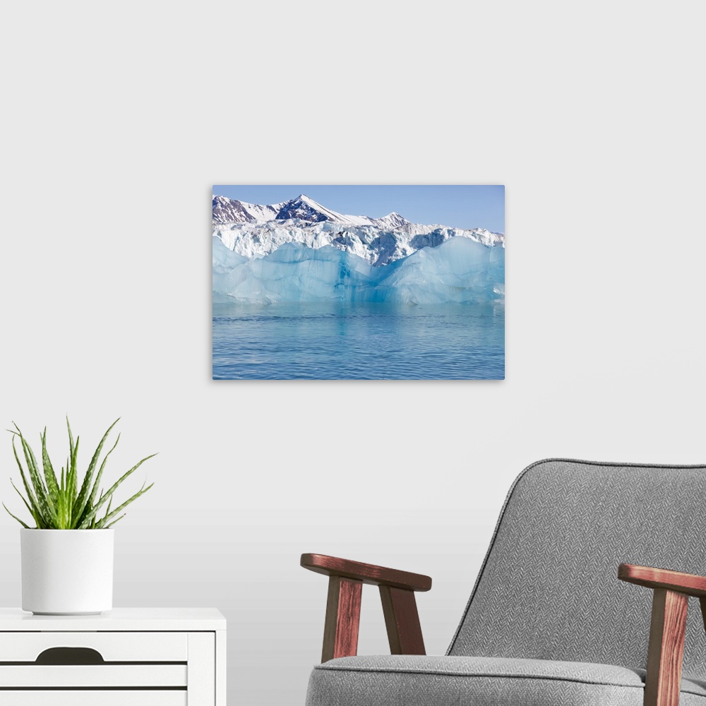 A modern room featuring Norway, Svalbard, ice at the base of the Monacobreen glacier.