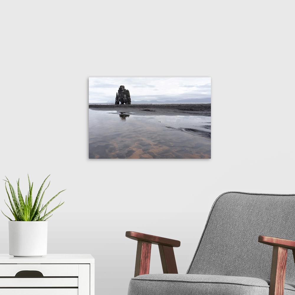 A modern room featuring Iceland, Hvitserkur. This sea stack or monolith represents a legend that it was a troll that was ...