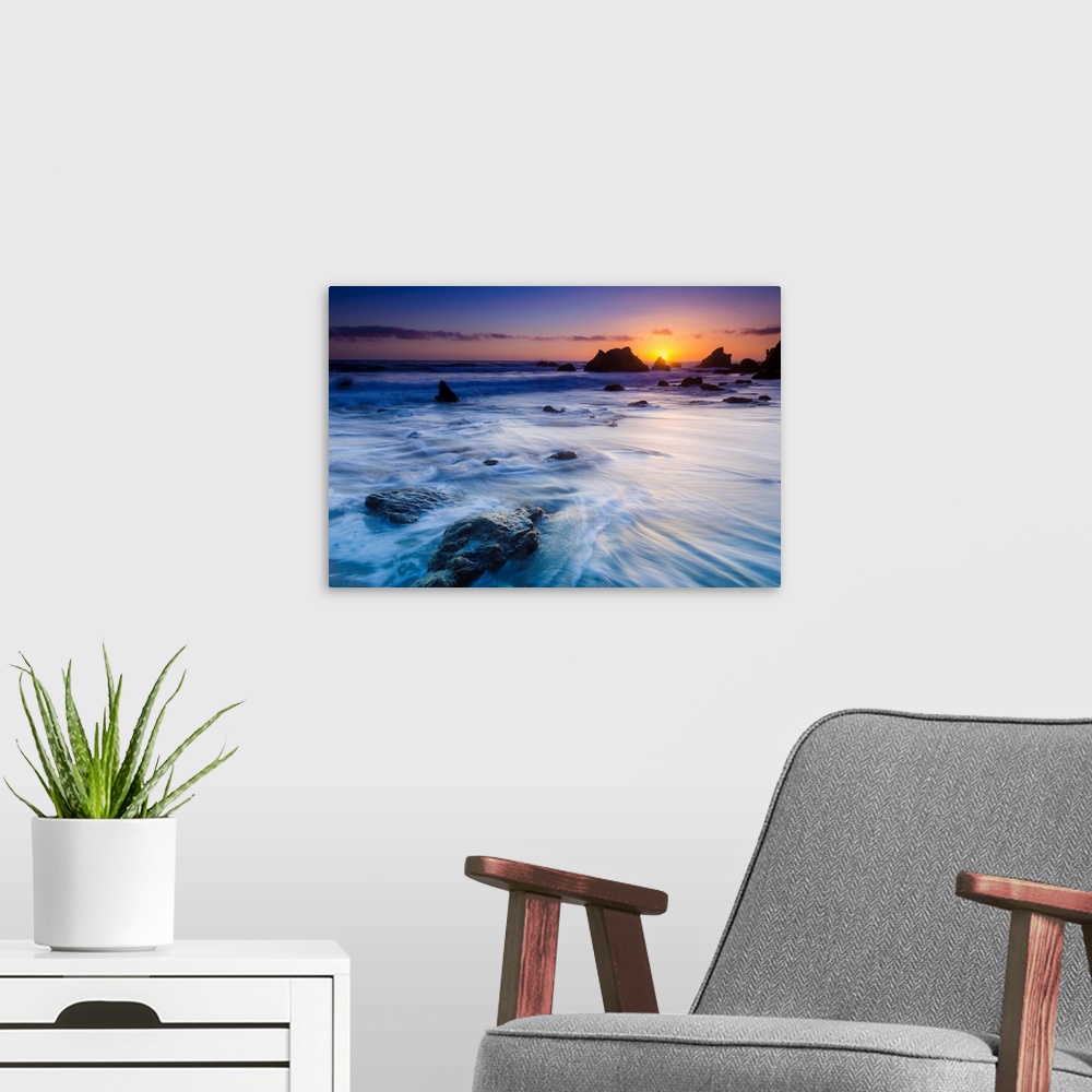 A modern room featuring Sea stacks at sunset, El Matador State Beach, Malibu, California USA.