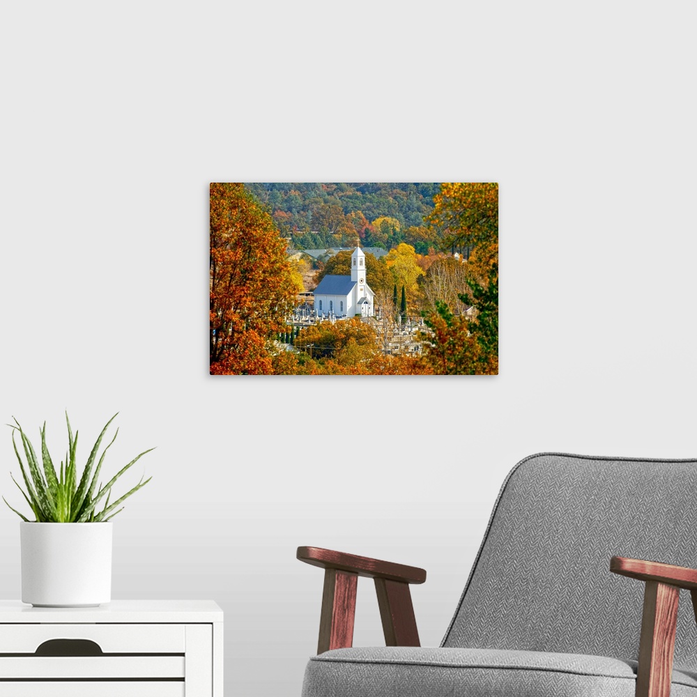A modern room featuring St. Sava Serbian Church and cemetary in Jackson, California surrounded by fall colors