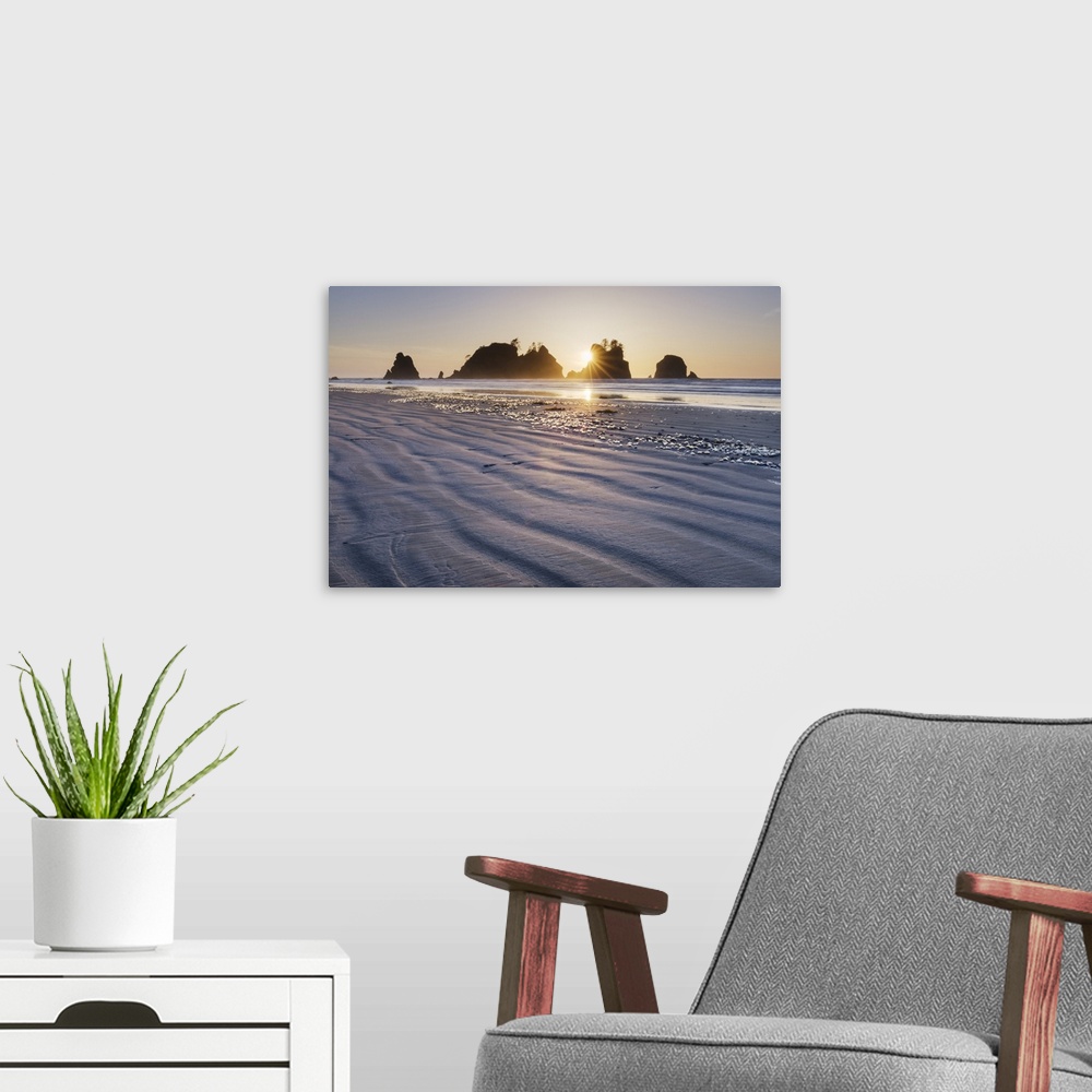 A modern room featuring Sunset on Shi Shi Beach, sea stacks of Point of the Arches are in the distance. Olympic National ...