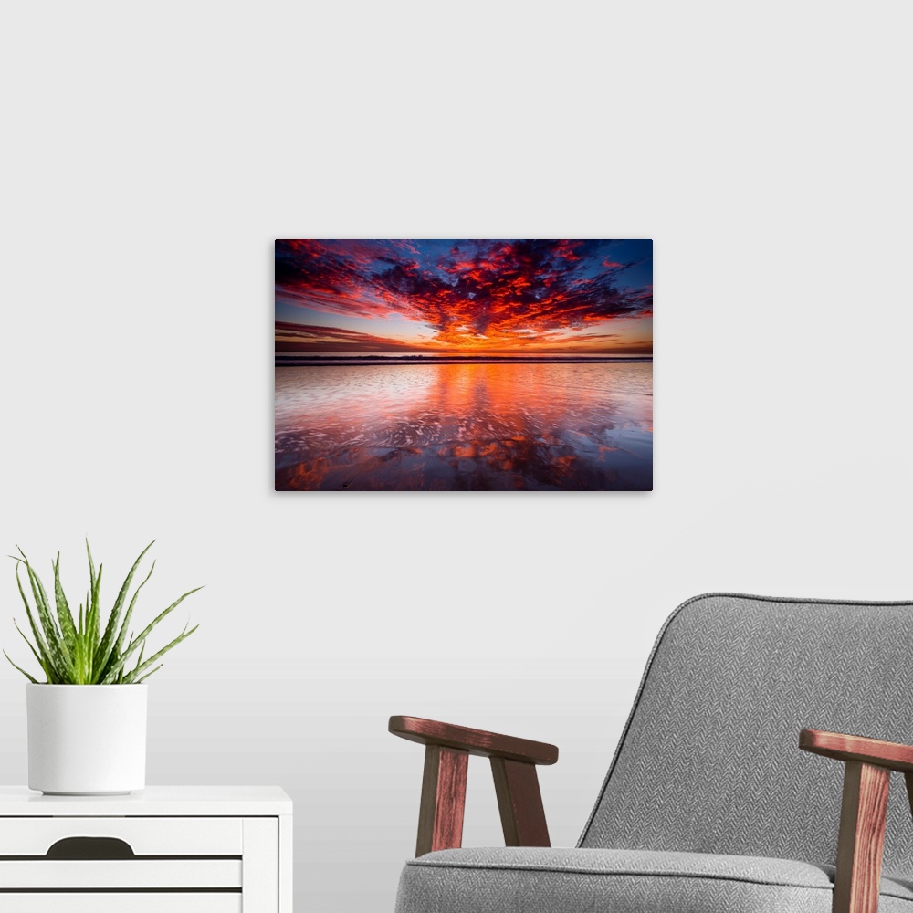 A modern room featuring Sunset over the Channel Islands from Ventura State Beach, Ventura, California USA.