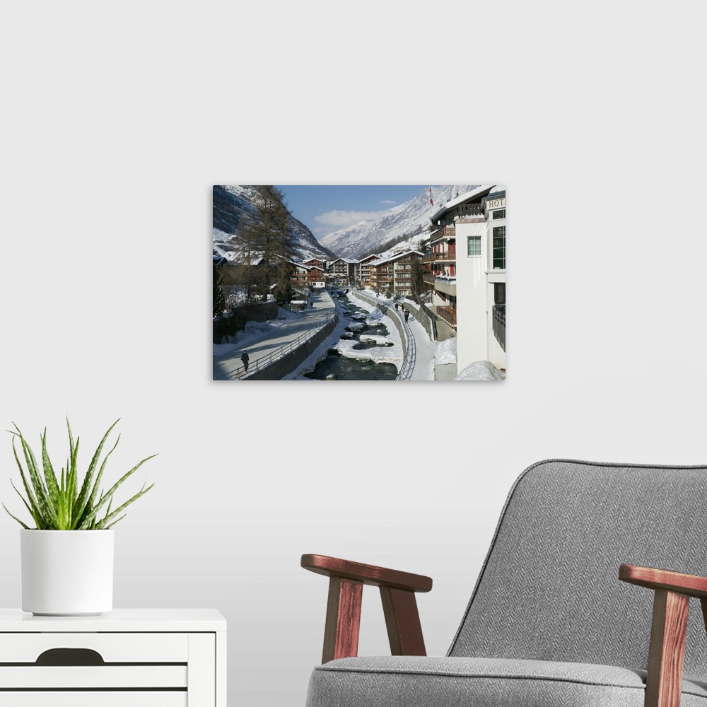 A modern room featuring SWITZERLAND-Wallis/Valais-ZERMATT:.Ski Chalets along the Mattervispa River / Winter... Walter Bib...