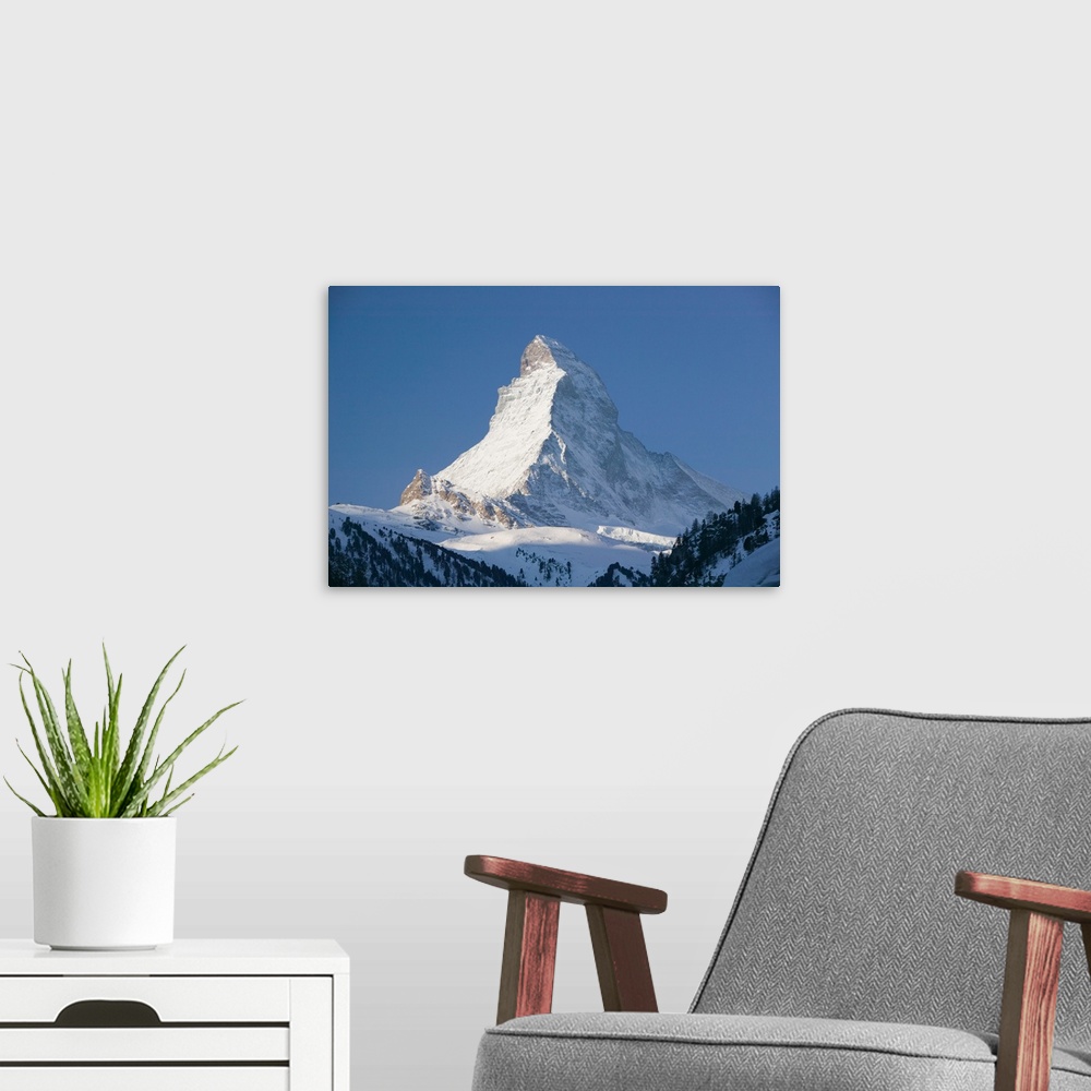 A modern room featuring SWITZERLAND-Wallis/Valais-ZERMATT:.The Matterhorn / Morning / Winter... Walter Bibikow 2005
