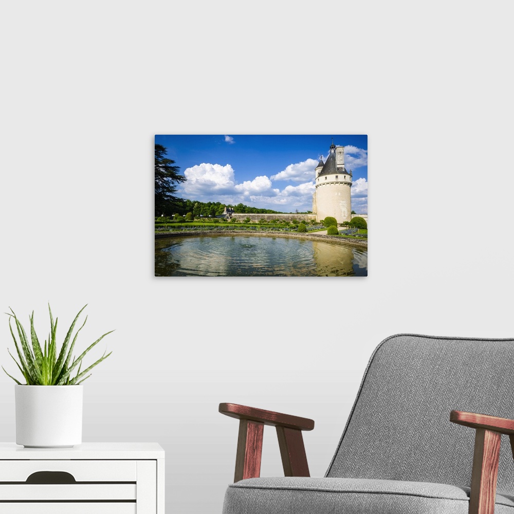 A modern room featuring The Marques Tower and fountain, Chateau de Chenonceau, Chenonceaux, Loire Valley, France.