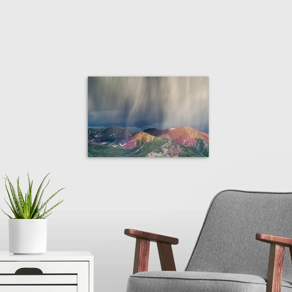 A modern room featuring Virga and storm moving over mountains near Crested Butte, Colorado