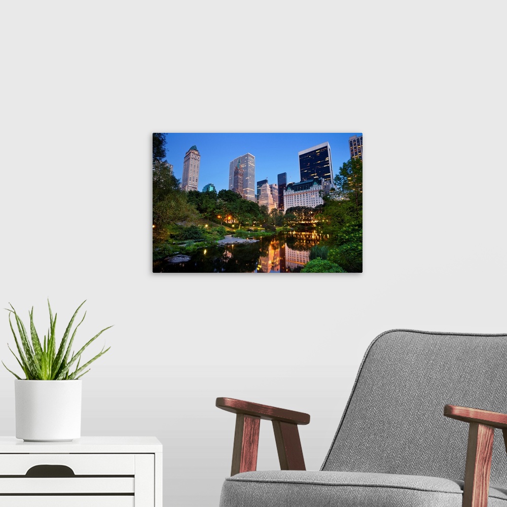 A modern room featuring Image of the midtown Manhattan skyline taken from Central Park, New York City.