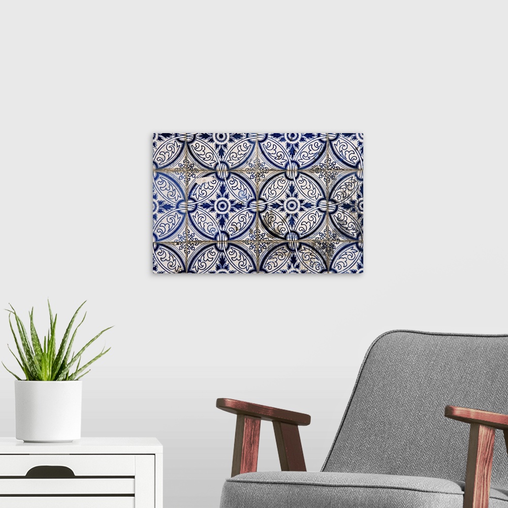 A modern room featuring Abstract pattern of Portuguese painted tiles with interesting designs.