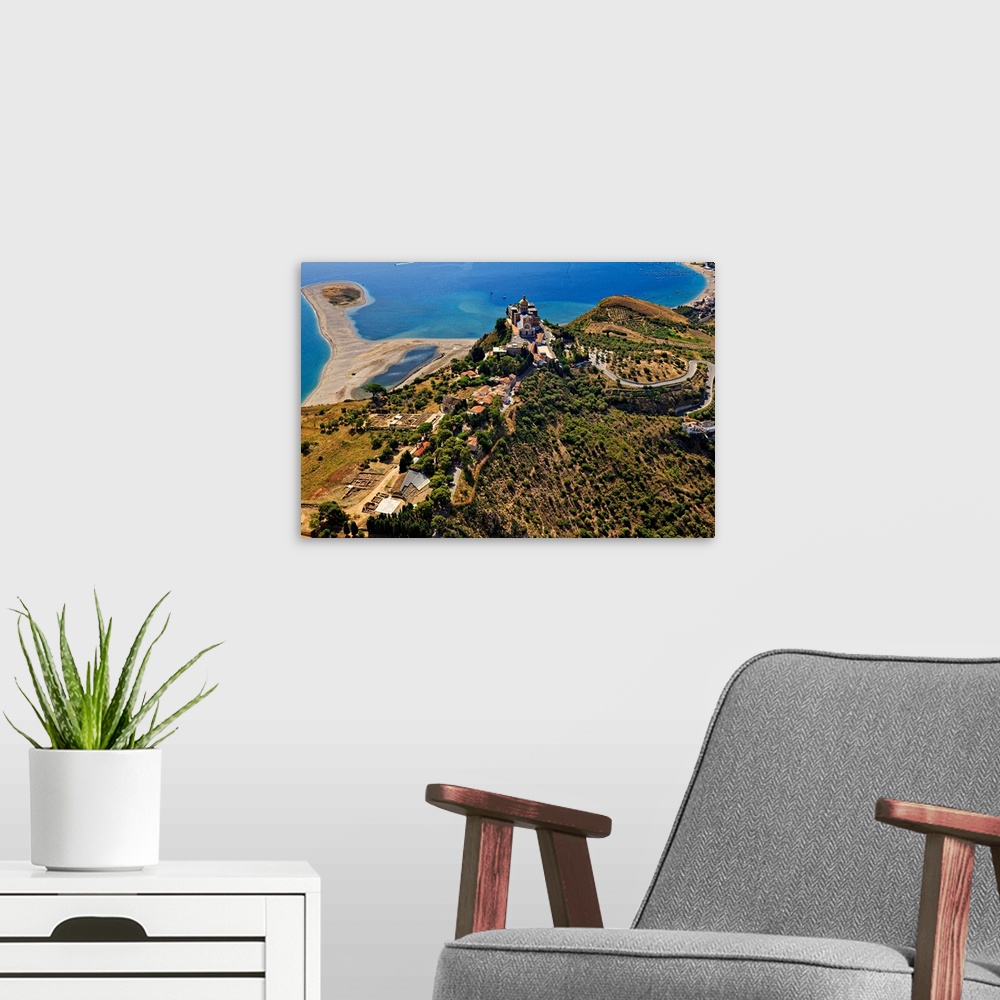 A modern room featuring Italy, Sicily, Messina district, Tindari, Aerial view, town, lakes and Greek Theatre