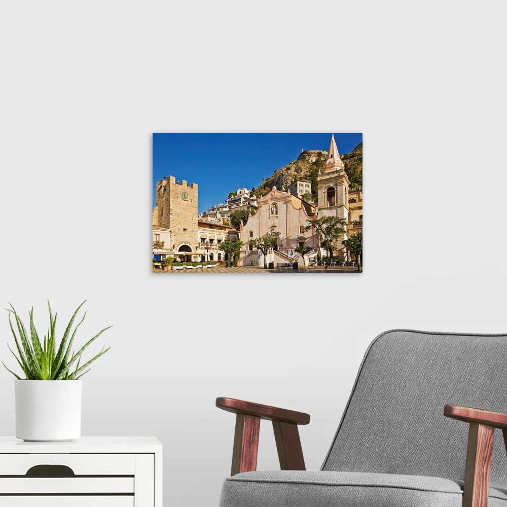 A modern room featuring Italy, Sicily, Taormina, Piazza IX Aprile, clock tower and San Giuseppe church