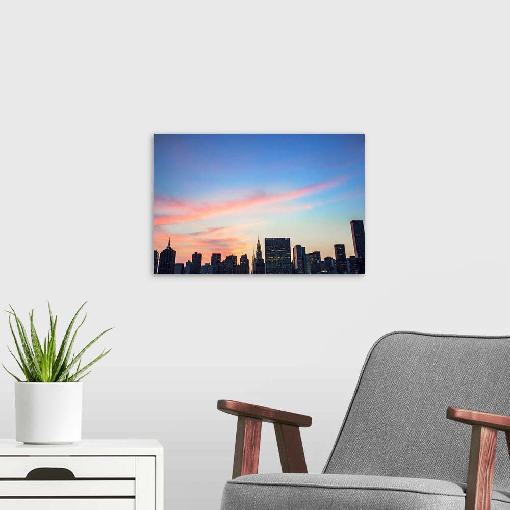 A modern room featuring New York, New York City, East Side skyline viewed from Long Island City