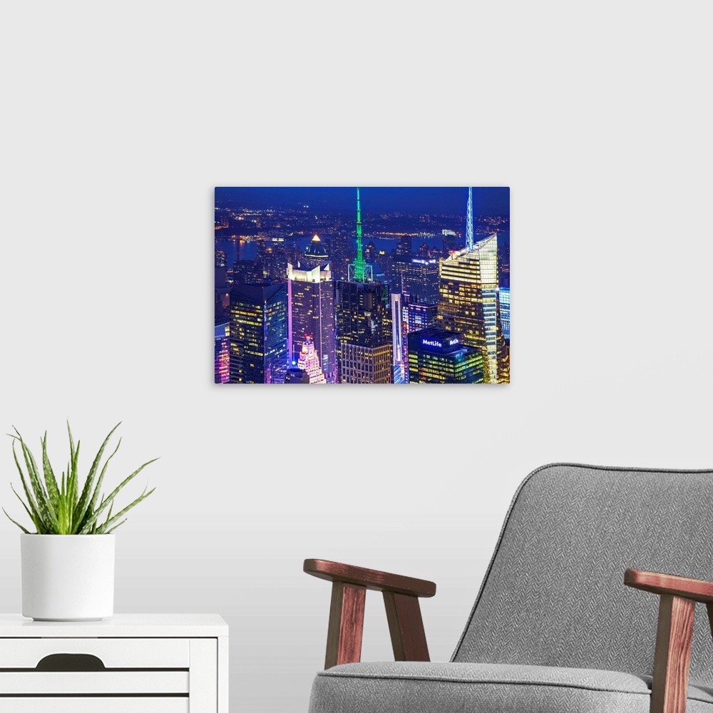 A modern room featuring NYC, Times Square skyline with Conde Nast and Bank of America buildings