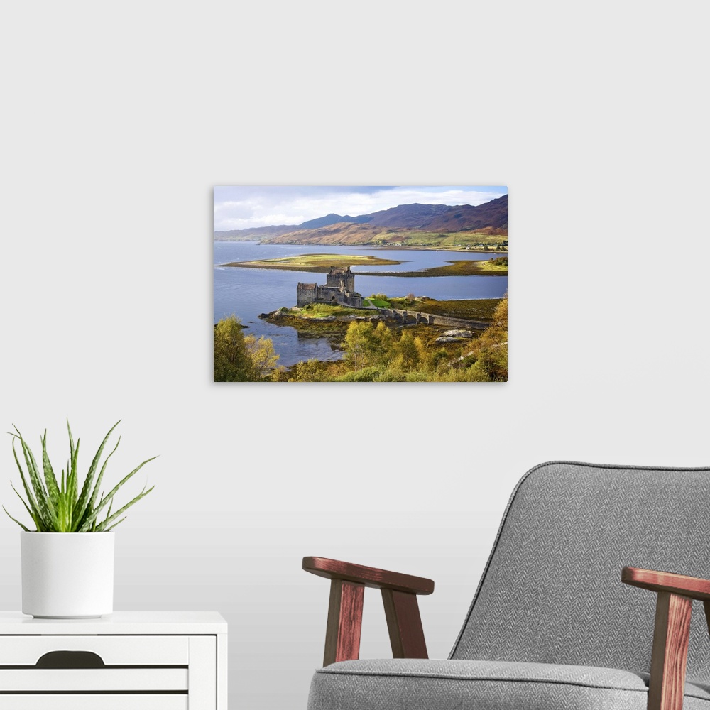 A modern room featuring UK, Scotland, Eilean Donan Castle, Dornie, view of the castle.