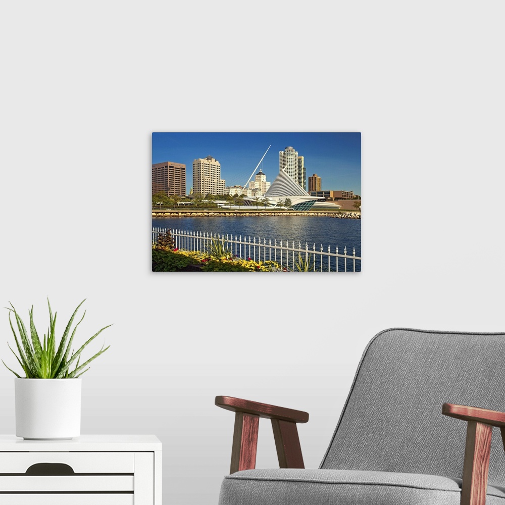 A modern room featuring Wisconsin, Milwaukee, scene of lake Michigan and city skyline