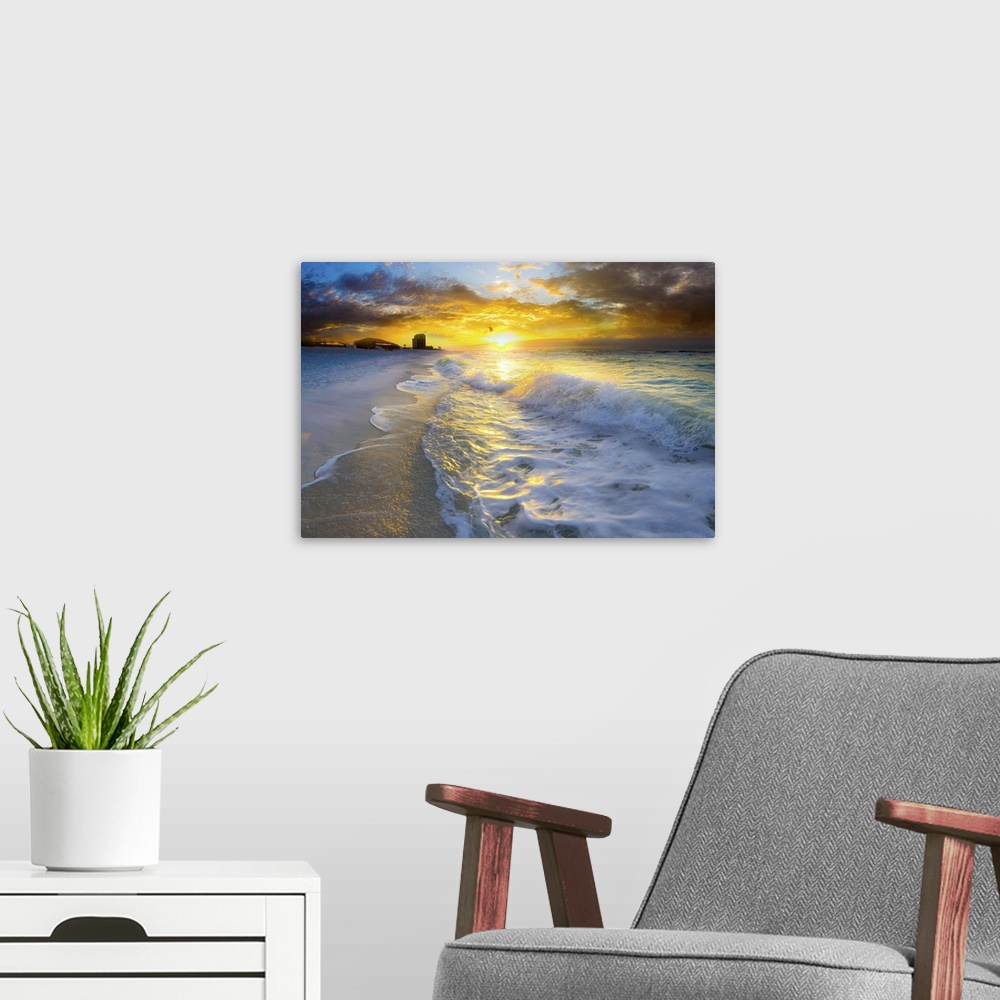 A modern room featuring A beautiful beach landscape at sunrise with ocean waves.
