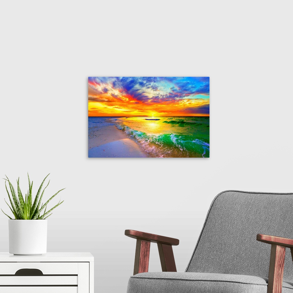 A modern room featuring An orange sunset over ocean waves striking the beach. Beautiful and relaxing sunset on the beach.