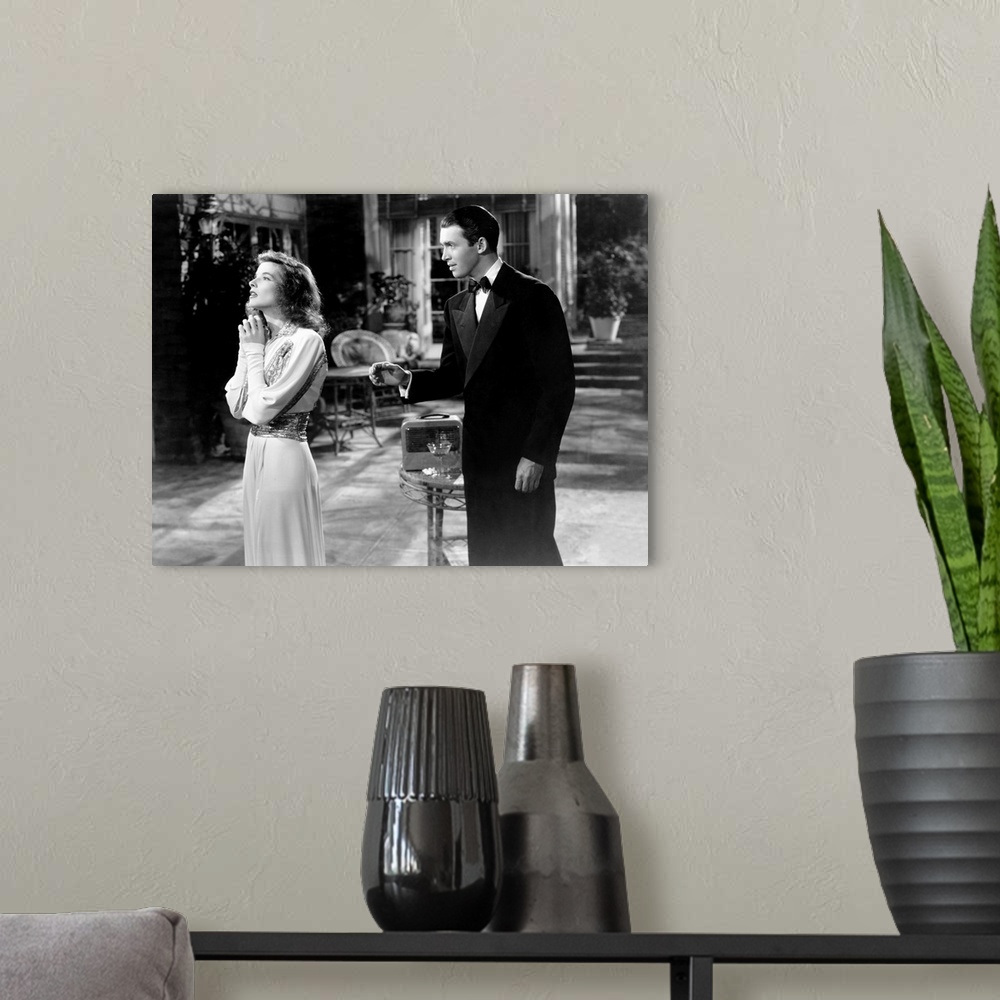 A modern room featuring THE PHILADELPHIA STORY, from left: Katharine Hepburn, James Stewart, 1940