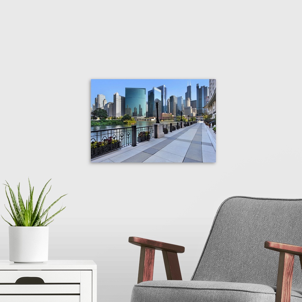 A modern room featuring Large photograph of a sidewalk in Chicago, Illinois (IL) with downtown skyscrapers visible in the...