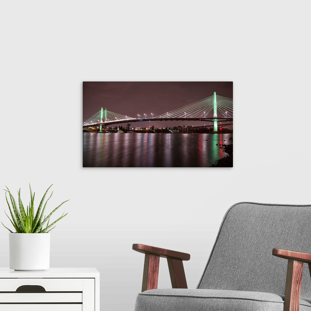 A modern room featuring Evening photograph of Tilikum Crossing cable bridge in Portland, Oregon.