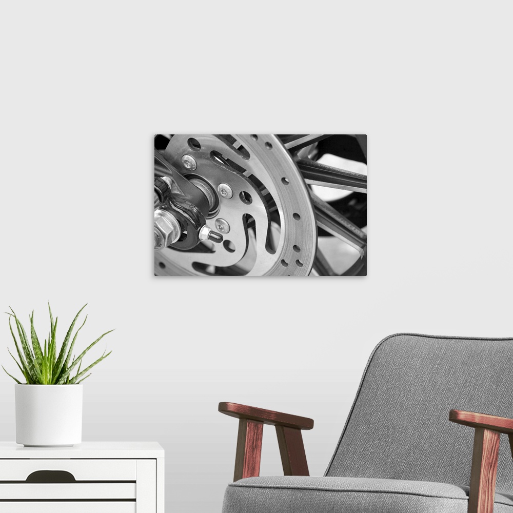 A modern room featuring Black and White abstract motorcycle wheel