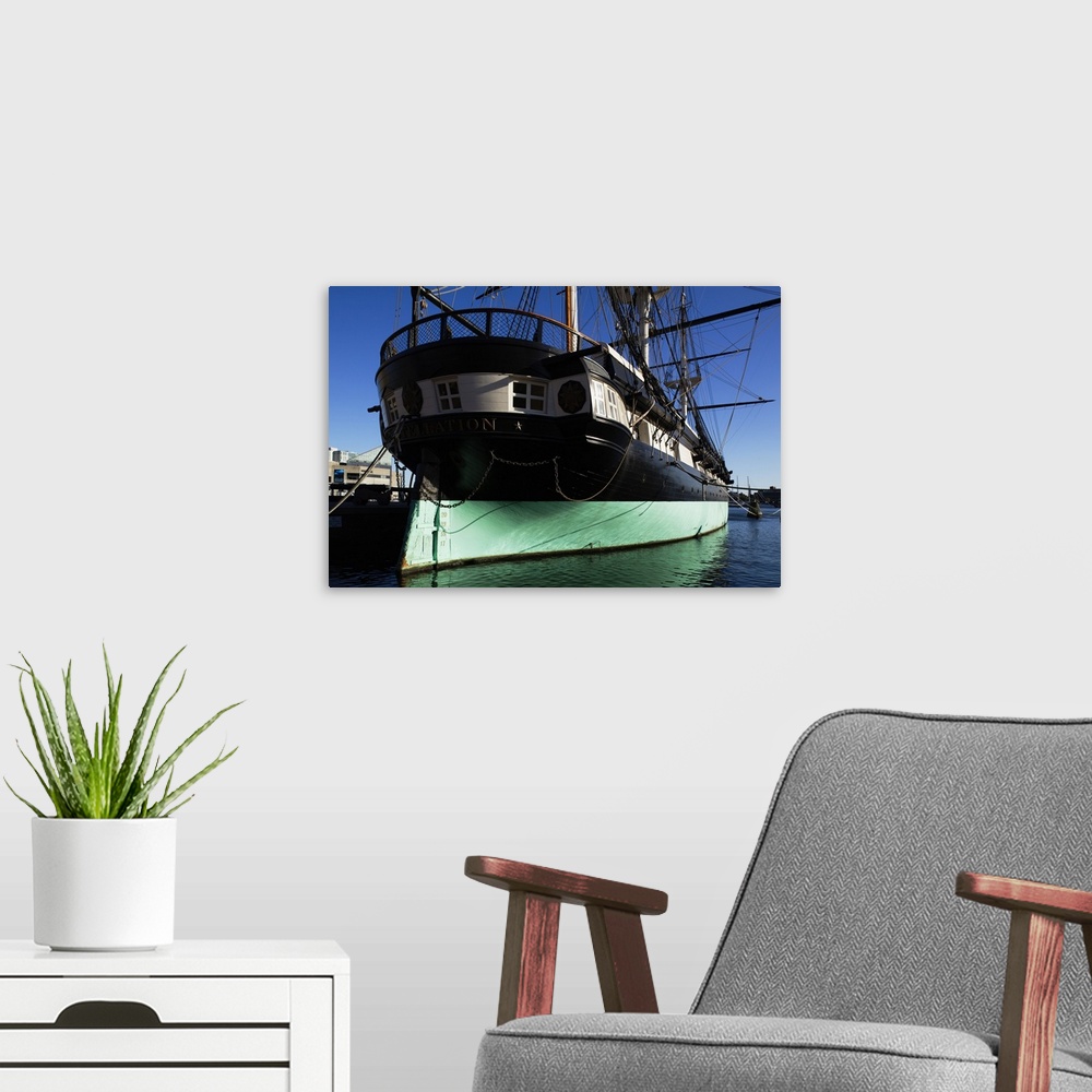 A modern room featuring USA, Maryland, Baltimore, Inner Harbor, USS Constellation, historic ship.