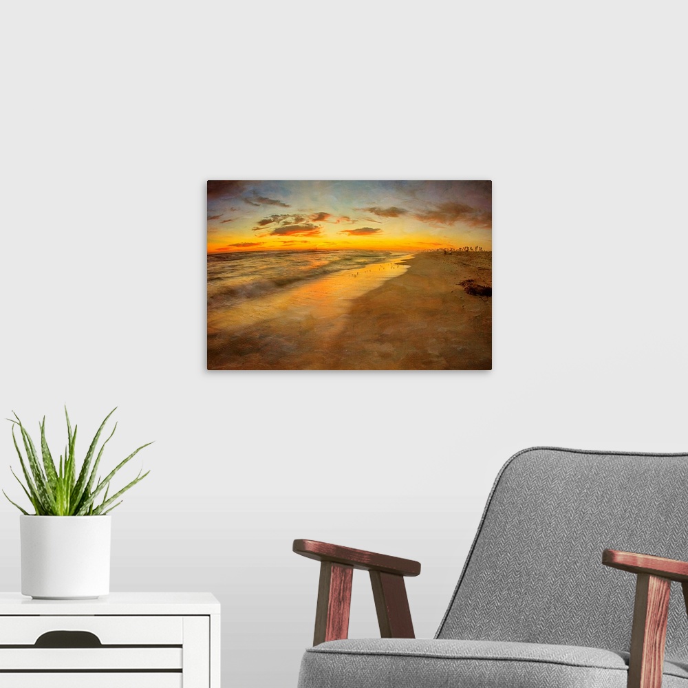 A modern room featuring View of beach at sunset in over Pacific ocean, Huntington Beach, California.