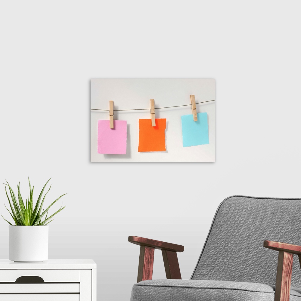 A modern room featuring Blank notes on laundry clothesline