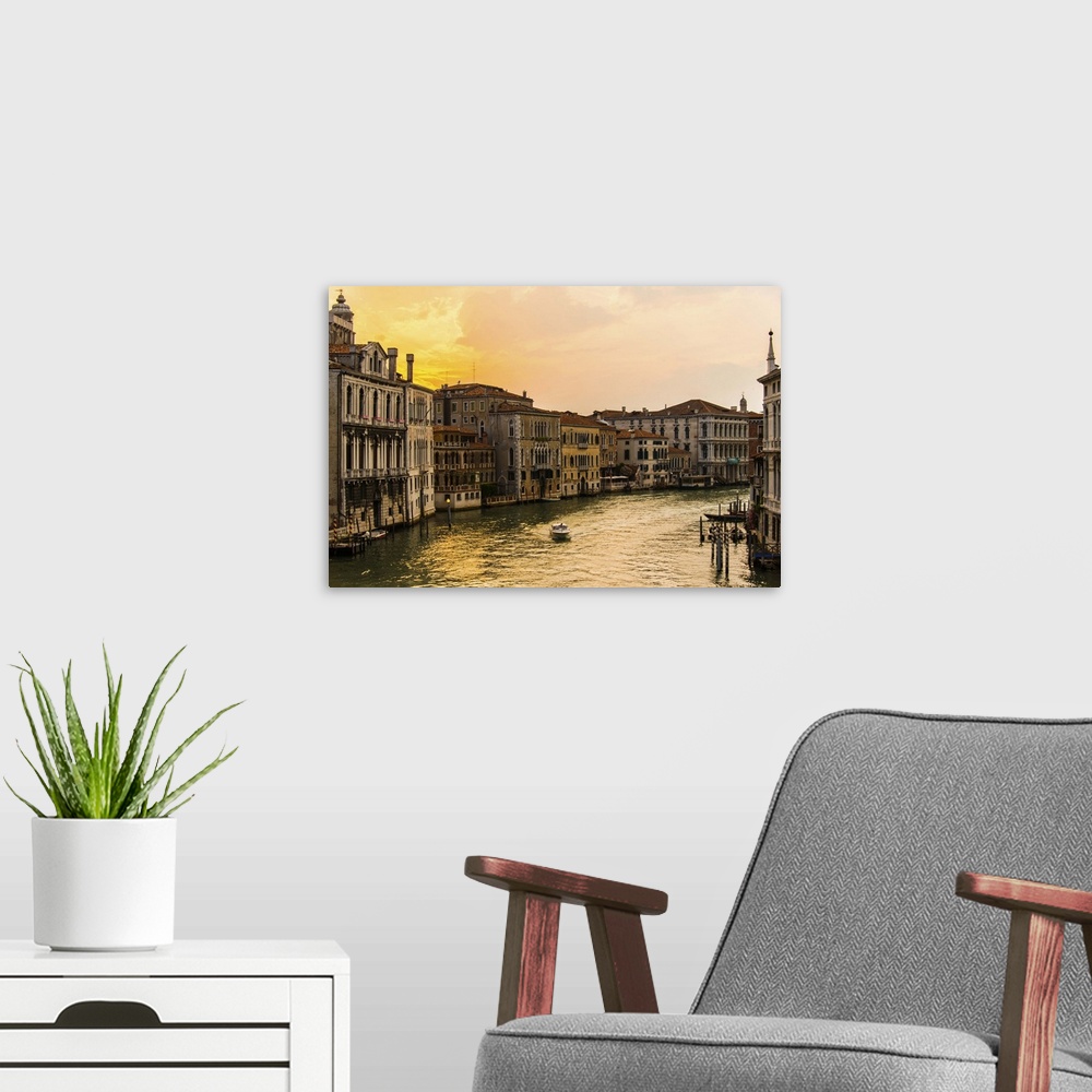 A modern room featuring View of Grand Canal, Venice at dusk.