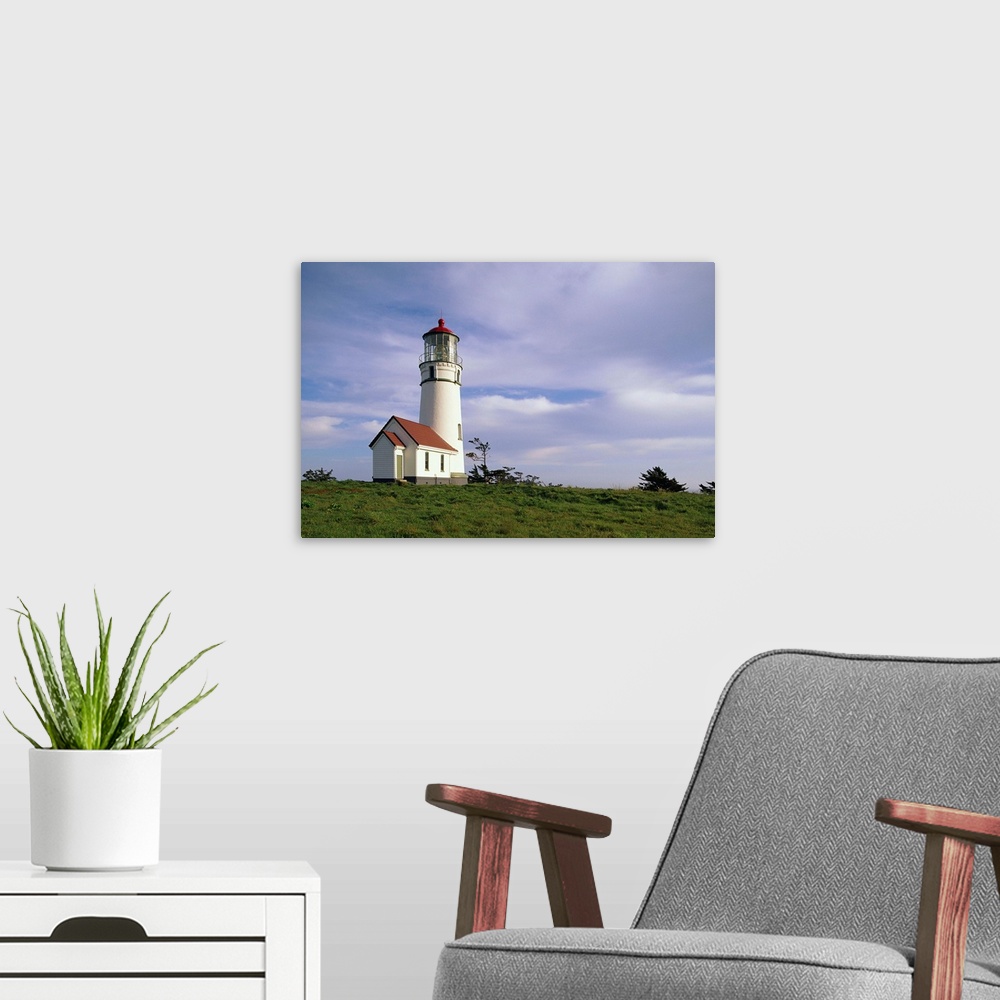 A modern room featuring Cape Blanco Lighthouse