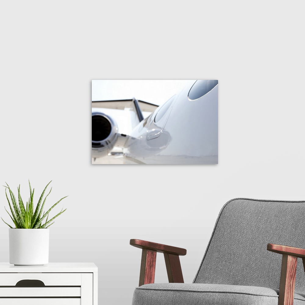 A modern room featuring Slick private jet, close up engine with limited focus