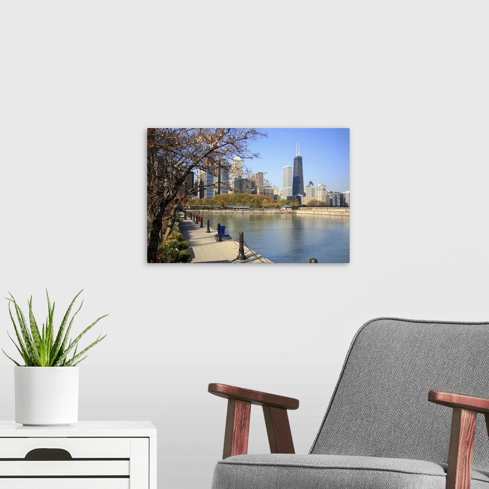 A modern room featuring Chicago Skyline with the Hancock Building, Lake Michigan, Chicago, Illinois, USA.Architecture, Ca...