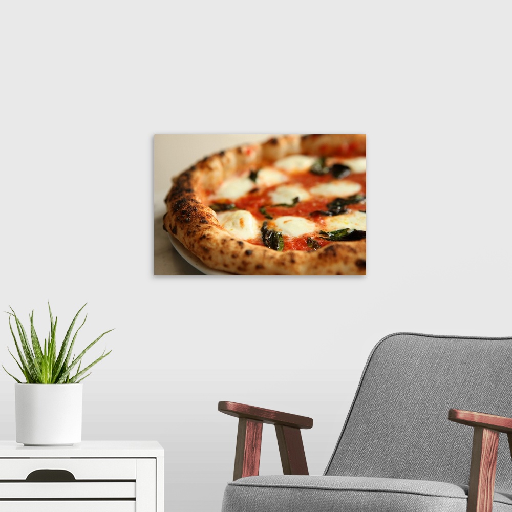 A modern room featuring Close-up of a whole pizza pie
