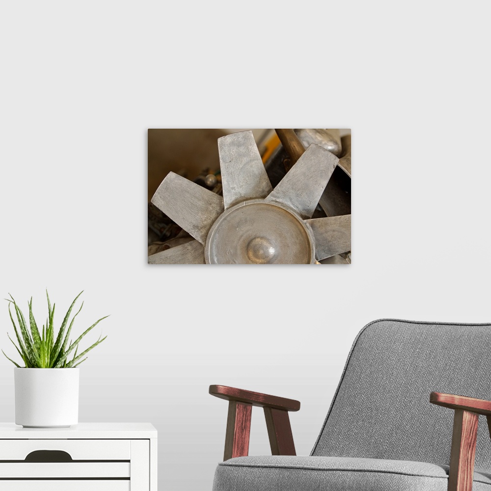 A modern room featuring Close-up of metal fan