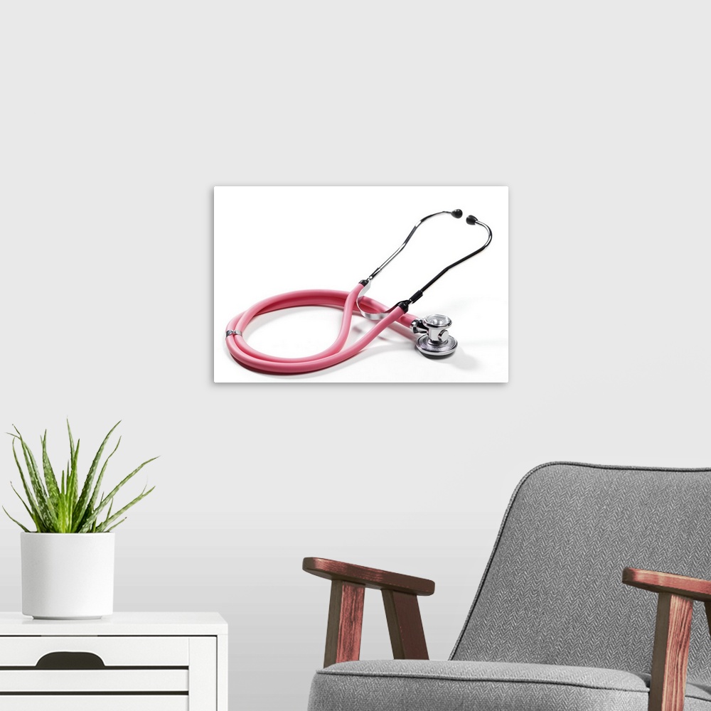 A modern room featuring Close up of pink stethoscope
