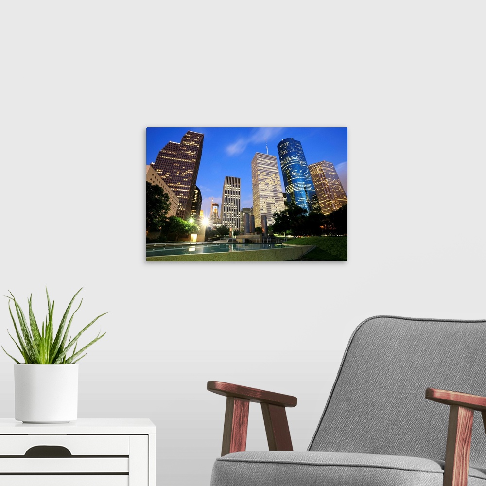 A modern room featuring Downtown Houston, Texas at dusk
