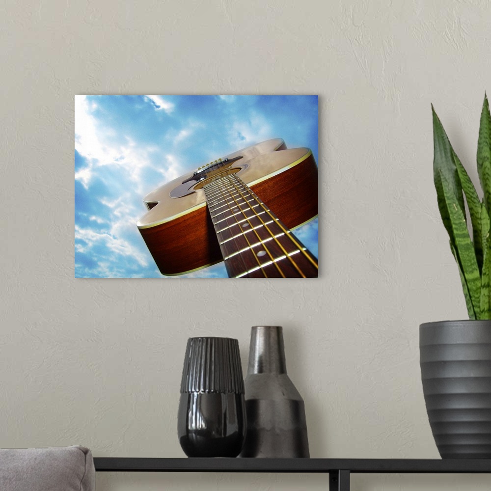 A modern room featuring A shot of acoustic folk guitar shot in Houston, Texas.