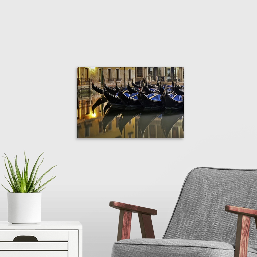 A modern room featuring Gondolas on canal in Venice