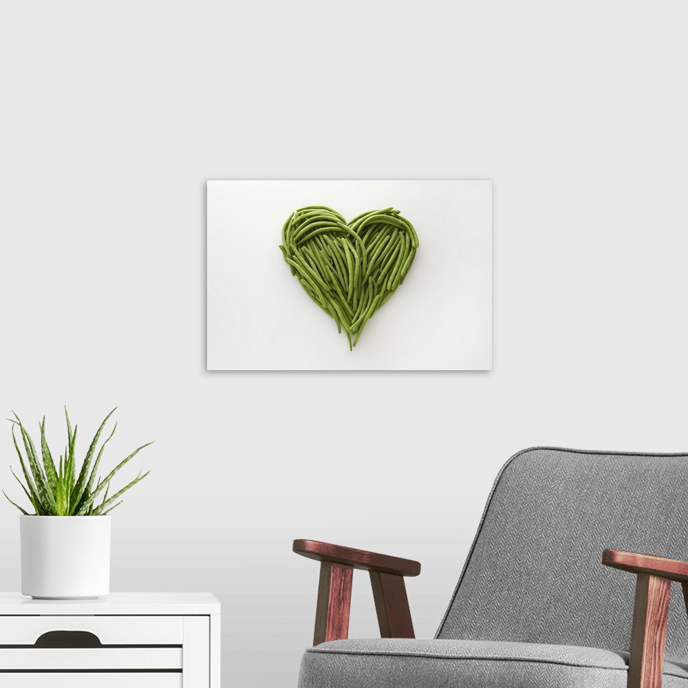 A modern room featuring Heart-shaped formed by fresh Green Beans