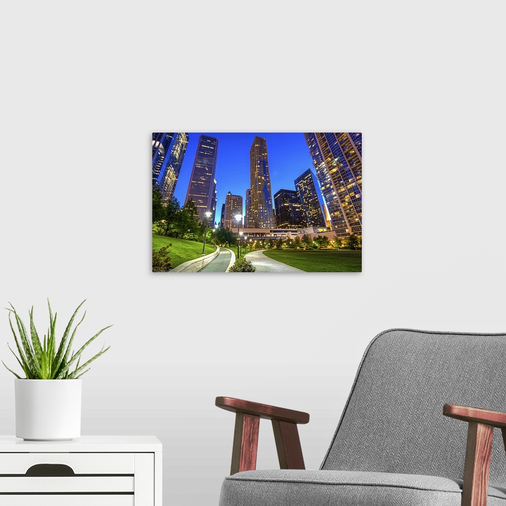 A modern room featuring Lakeshore East Park in Chicago looking toward the the Aon Center and Aqua buildings.