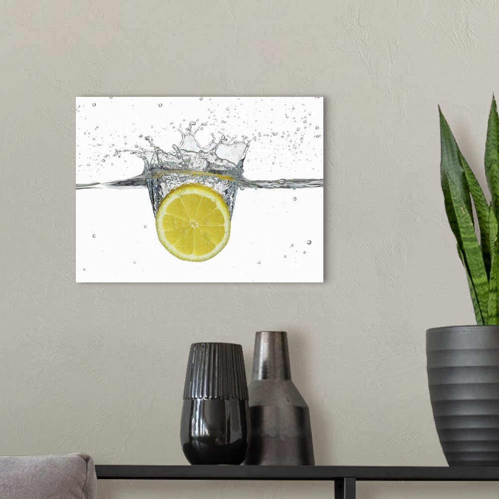 A modern room featuring Lemon splashing in water