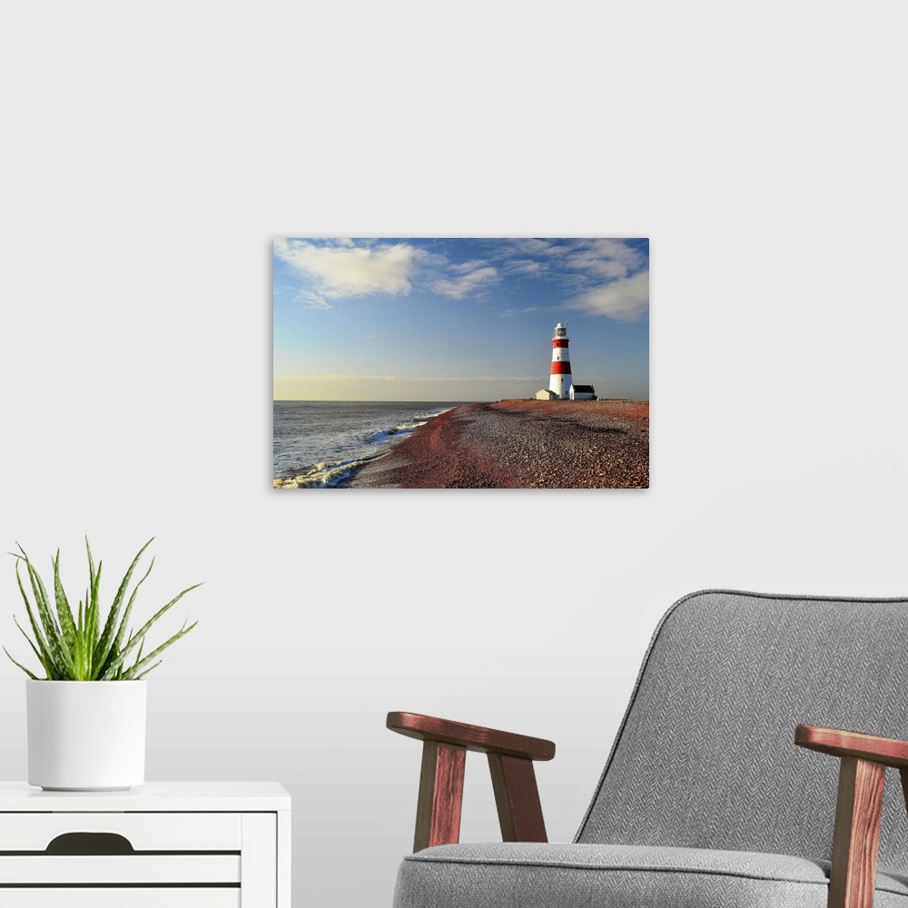 A modern room featuring Morning light at Orford Ness Lighthouse with sea and sea in background.