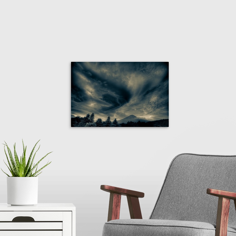 A modern room featuring Mount Fuji with incoming storm.
