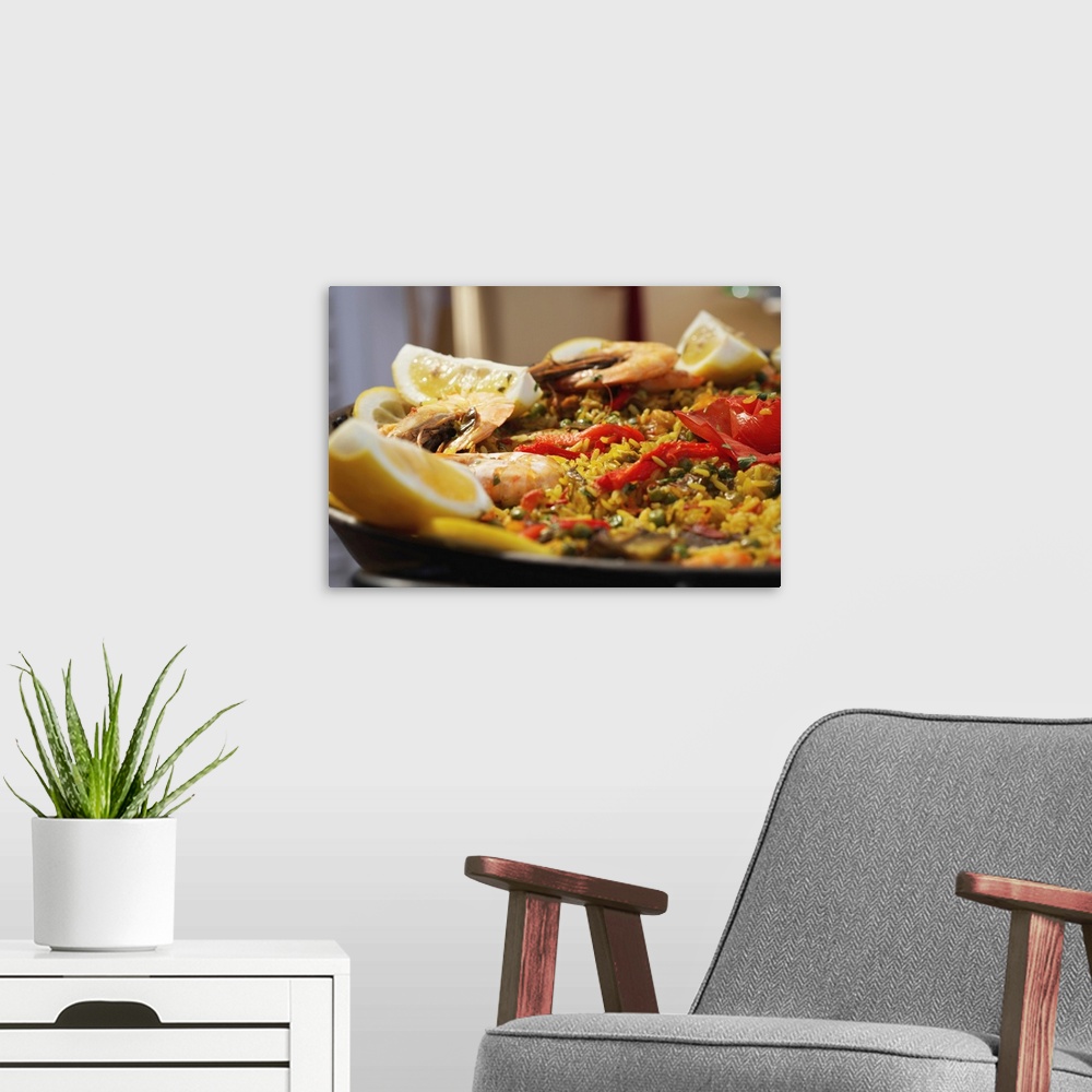 A modern room featuring Paella dish, close-up