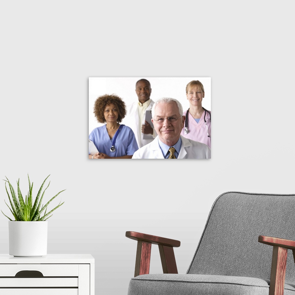A modern room featuring Portrait of four medical professionals, studio shot