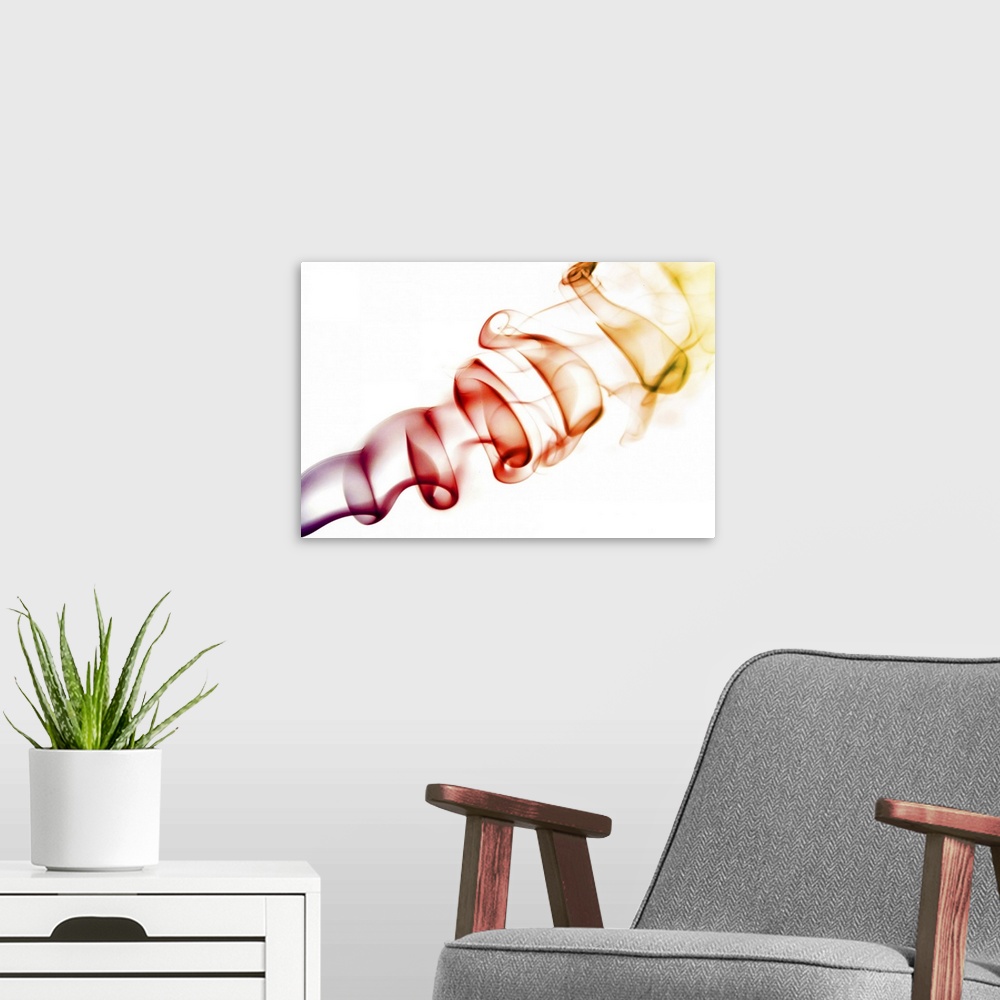 A modern room featuring Abstract image of smoke curls isolated against white and coloured Purple/Red/Orange/Yellow.
