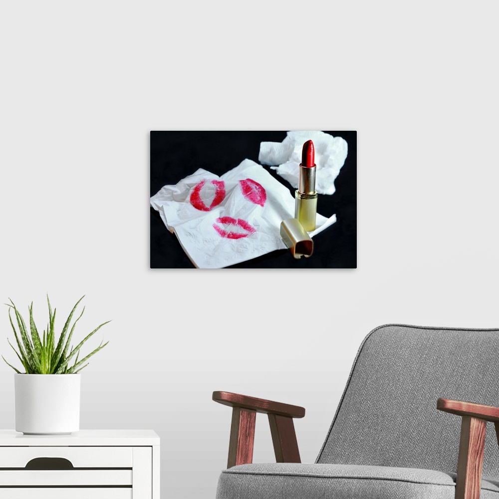 A modern room featuring Still Life of red lipstick and napkin with lipstick stains.