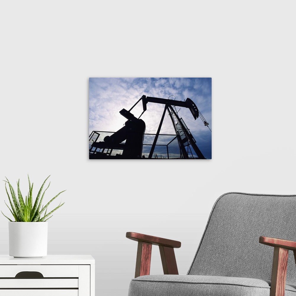 A modern room featuring Silhouette of oil derrick